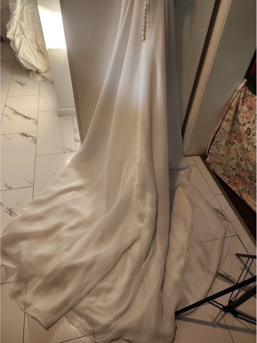 Elegant White Beaded Evening Gown with Sheer Embellished Bodice and Flowing Skit - Picture 7 of 9